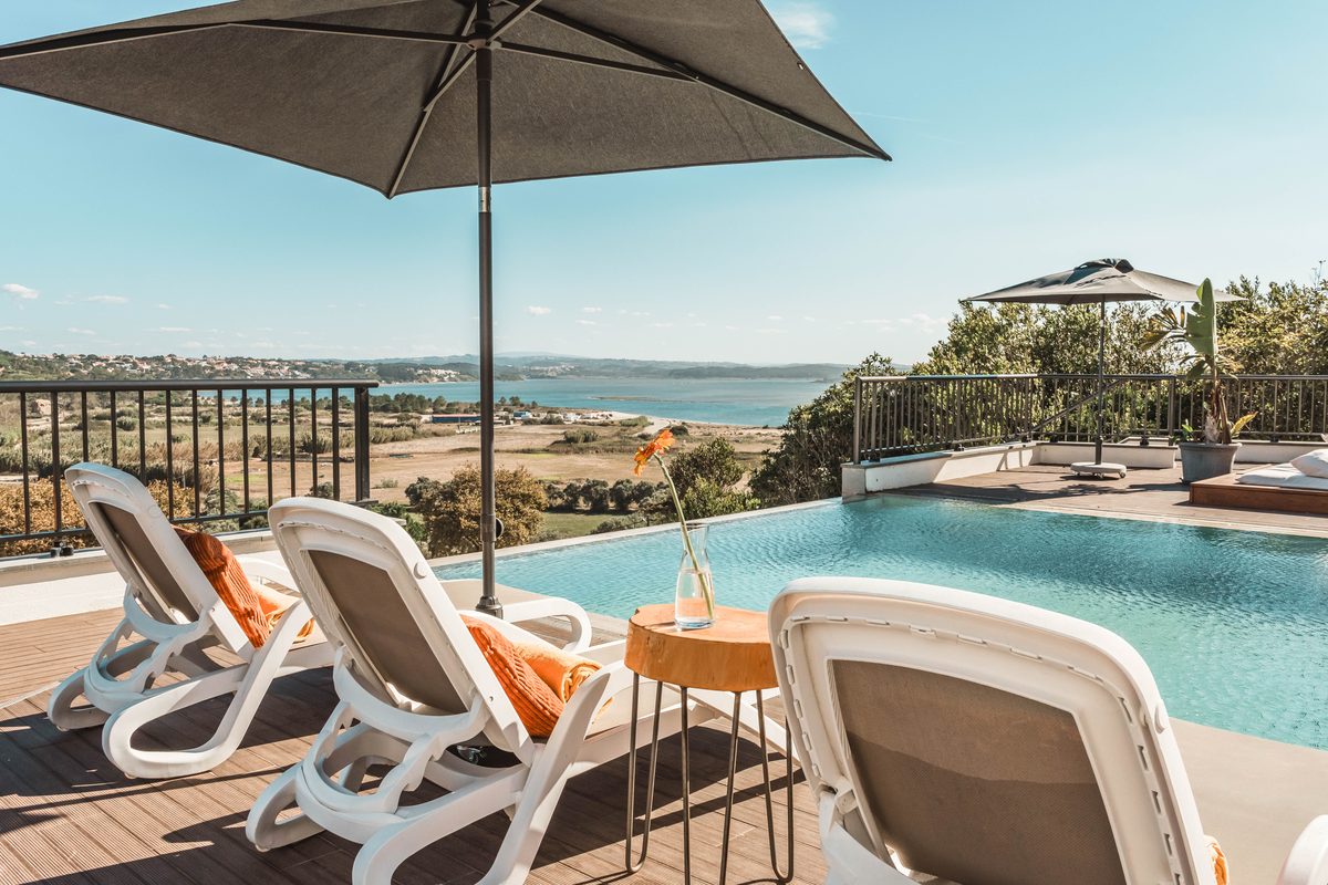 The pool at Hillside House, with the lagoon beyond
